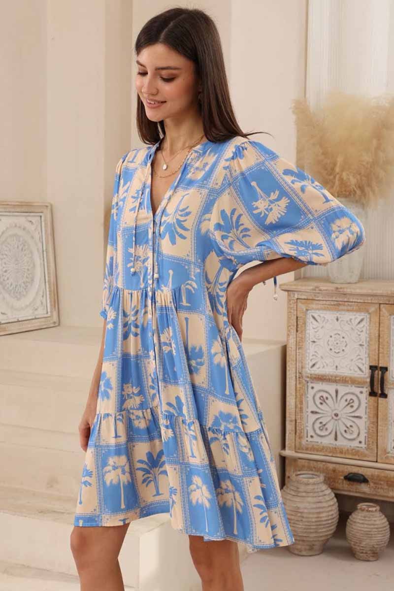 iris maxi loose fitting dress with loose bell sleeve button through front palm print fabric side view 