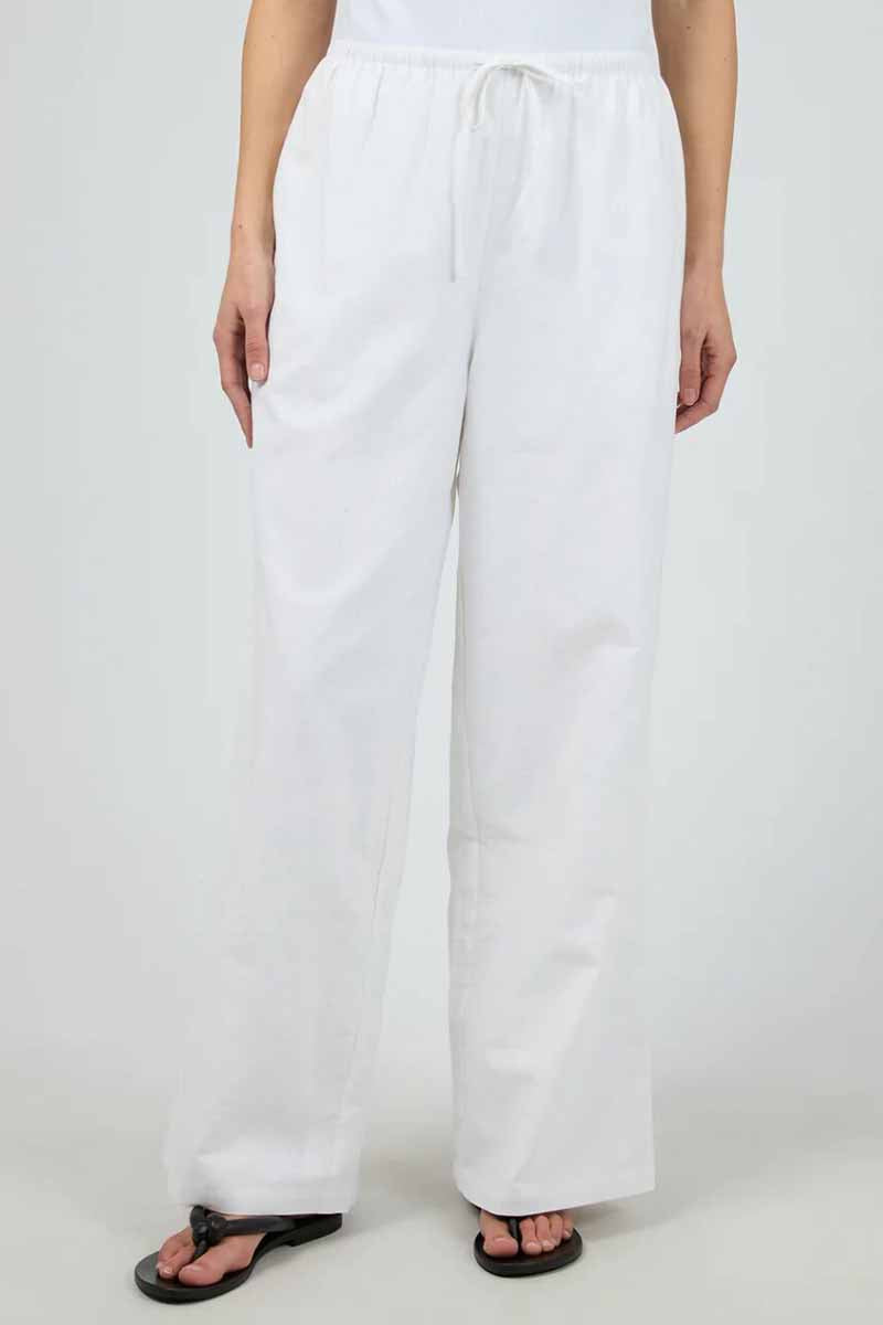 silent theory long loose white linen pant with draw string waist, close up view of pants 