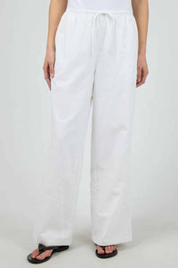 silent theory long loose white linen pant with draw string waist, close up view of pants 